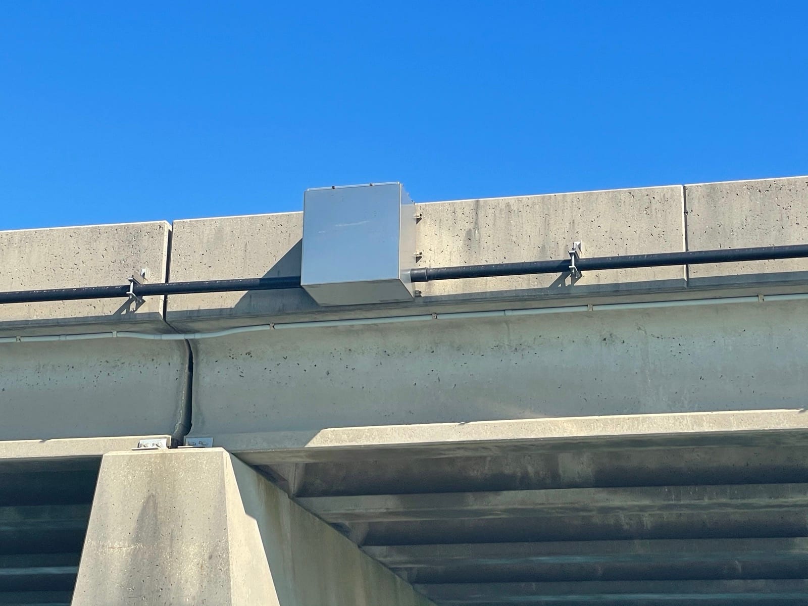 Bridge network enclosure integrated into the conduit run