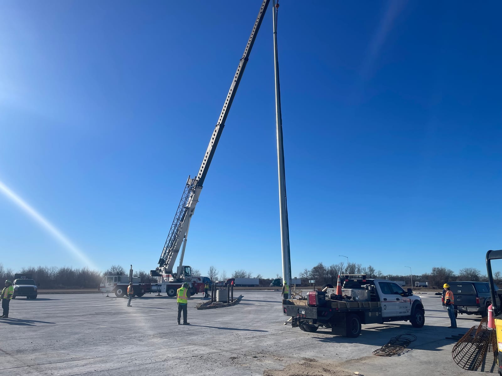 High-mast pole installation underway at the West Memphis truck parking facility