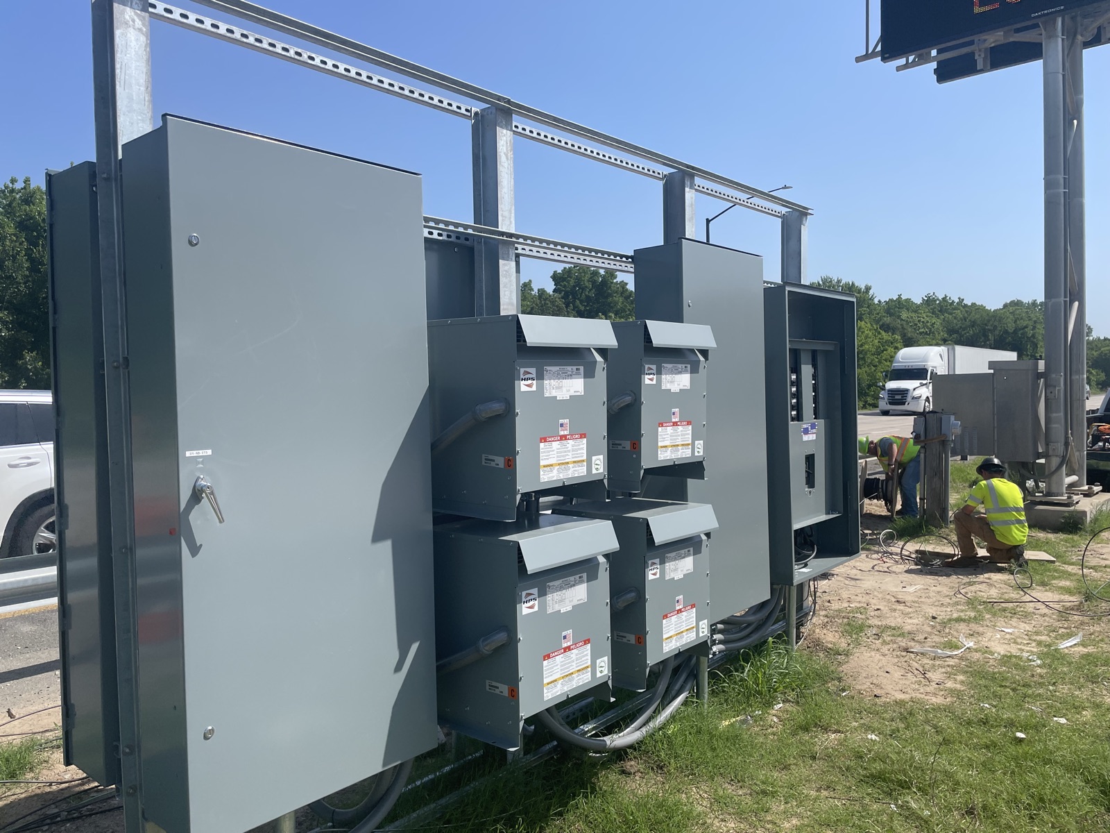 DMS electrical distribution panels and transformers beside I-430
