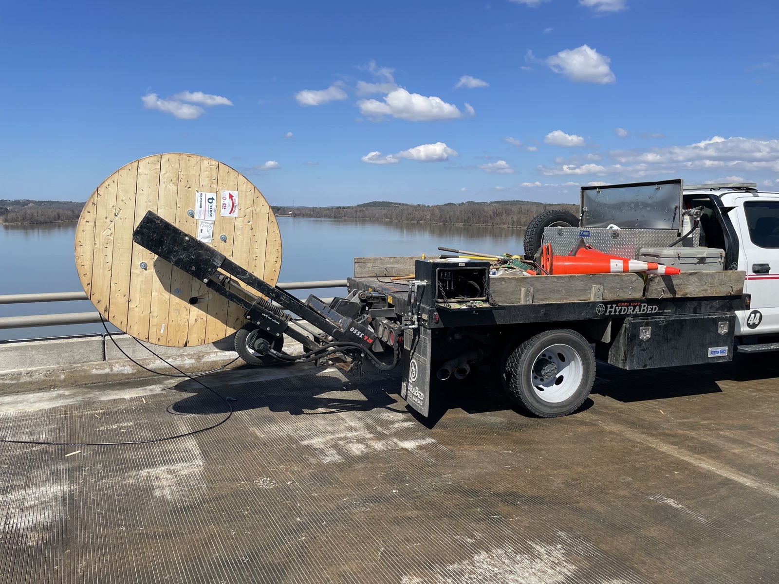 Large fiber reel and reel-lift truck on the I-430 crossing