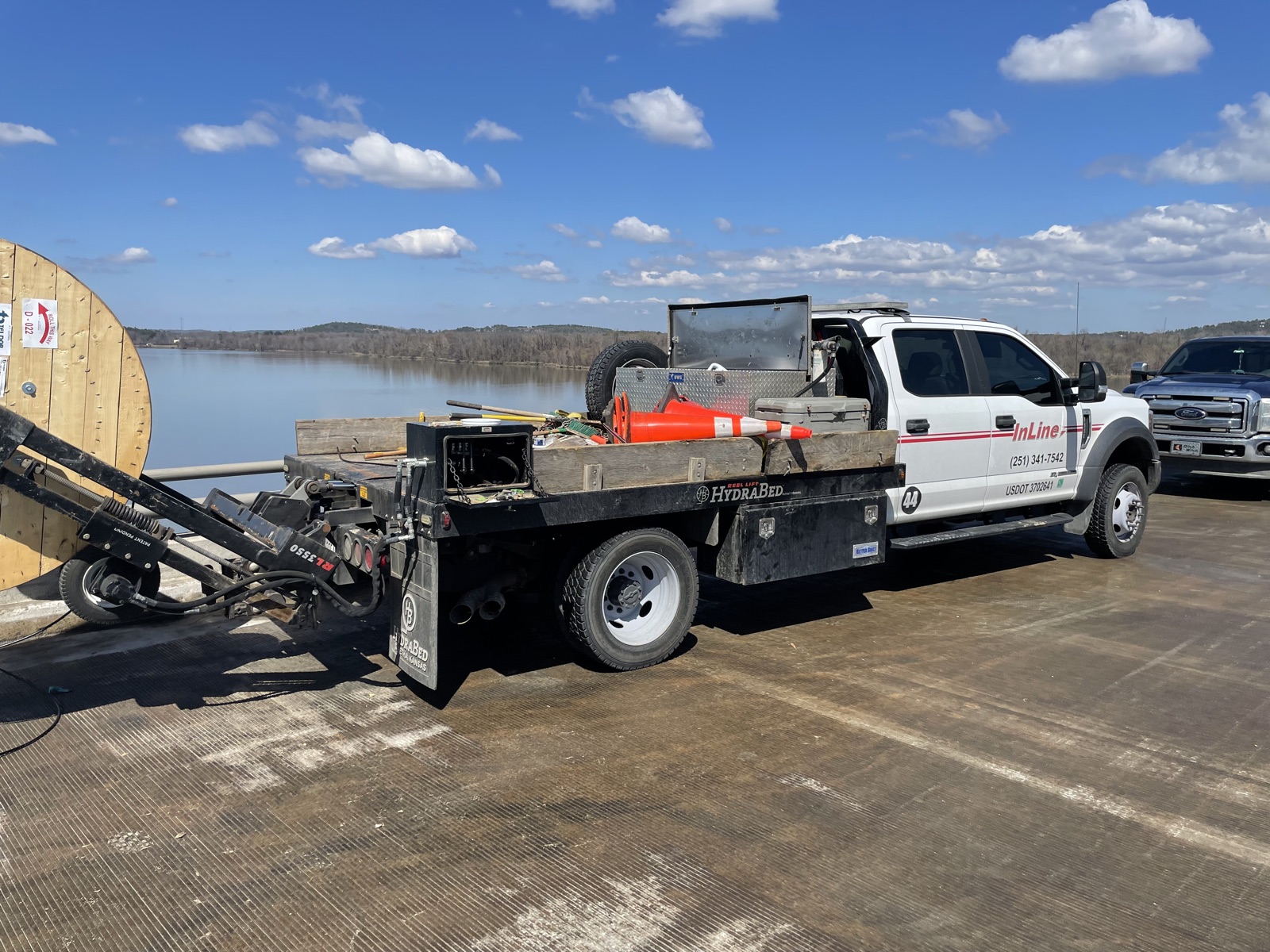 InLine reel truck staged for a fiber pull on the I-430 river bridge